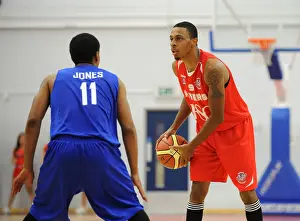 Bristol Flyers V Durham Wildcats Prints: Intense Rivalry: Herring vs. Jones Showdown - Flyers vs. Wildcats Basketball Clash