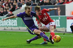 Bristol City V Charlton Prints: Intense Rivalry: Joe Bryan vs Chris Solly Battle at Ashton Gate