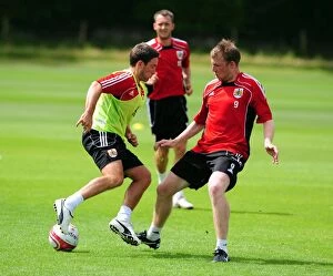Images Dated 6th July 2010: Intense Rivalry: Johnson vs. Clarkson - A Hard-Fought Training Battle at Bristol City