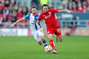 Bristol City V Blackburn Rovers Prints: Intense Rivalry: Lee Tomlin vs. Corry Evans Clash at Ashton Gate