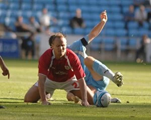 Coventry City V Bristol City Collection: Intense Rivalry: Lee Trundle's Battle on the Field - Coventry City vs. Bristol City