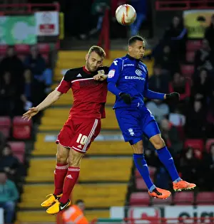 Bristol City V Birmingham City Prints: Intense Rivalry: Liam Kelly and Ravel Morrison Clash in Bristol City vs Birmingham City