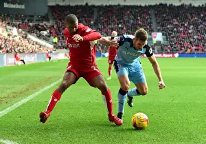 Bristol City V Rotherham United Prints: Intense Rivalry: Mark Little vs Joe Mattock in Bristol City vs Rotherham United Clash