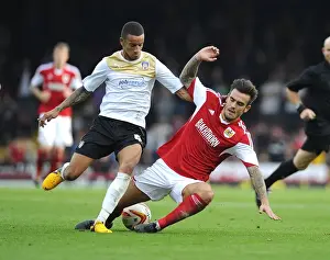 Bristol City V Colchester United Prints: Intense Rivalry: Marlon Pack vs Craig Eastmond - Battle for Possession