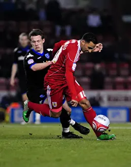 Intense Rivalry: Maynard vs. Hogg in the Championship Clash between Bristol City and Portsmouth, March 2011