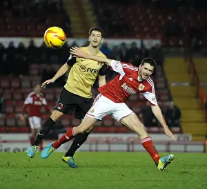 Bristol City V Leyton Orient Prints: Intense Rivalry: Moloney vs. James - A Football Battle for the Ball