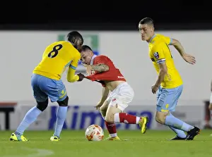 Framed Print : Intense Rivalry: Monelle vs. Boateng Clash in Bristol City U21s vs Crystal Palace U21s Football Match