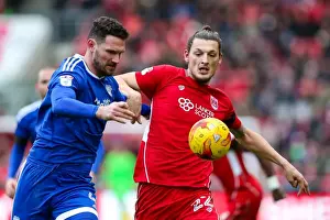 Bristol City V Cardiff City Prints: Intense Rivalry: Morrison vs Djuric - Battle for Supremacy in Bristol City vs Cardiff City