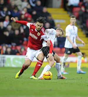 Intense Rivalry: Pack vs. Reeves - A Battle for Possession in Sky Bet League One's Bristol City vs