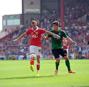 Intense Rivalry on the Pitch: Wilbraham vs Canavan in Bristol City vs Scunthorpe United Football Clash