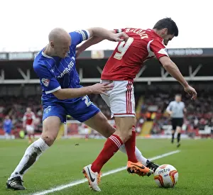 Bristol City V Gillingham Prints: Intense Rivalry: Sam Baldock vs Adam Barrett - A Football Showdown at Ashton Gate