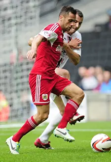 MK Dons V Bristol City Prints: Intense Rivalry: Sam Baldock vs Antony Kay - A Battle for Football Supremacy in Bristol City vs Milton Keynes Dons