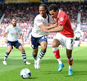 Title Race Prints: Intense Rivalry: Smith vs. Johnson Clash in Preston North End vs