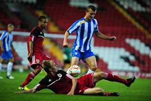 Images Dated 22nd August 2012: Intense Rivalry: Tom King vs. Alex Gilbey - U21 Clash at Ashton Gate, 2012