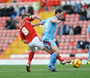 Bristol City V Tranmere Rovers Prints: Intense Rivalry: Wade Elliott vs Jason Koumas - A Footballing Battle in the Sky Bet League One Clash between Bristol