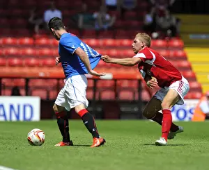 Intense Rivalry: Wagstaff vs Clark Battle on the Pitch - Bristol City vs Glasgow Rangers, 2013