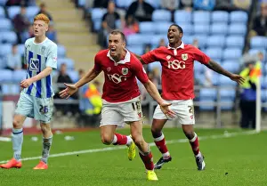 Coventry City V Bristol City Prints: Intense Rivalry: Wilbraham and Little's Throw-In Battle