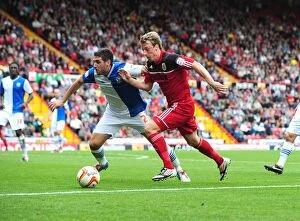 Bristol City v Blackburn Rovers Collection: Intense Rivalry: Woolford vs. Orr - A Football Battle in the Championship Clash between Bristol City