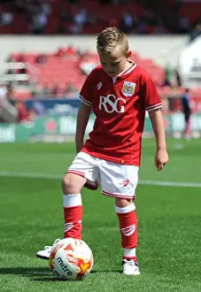 Bristol City V Brentford Prints: Intense Sky Bet Championship Showdown: A Moment with Bristol City Mascot at Ashton Gate