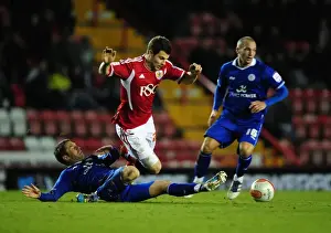 Bristol City V Leicester City Prints: Intense Tackle: Foster vs. Kennedy in Bristol City vs
