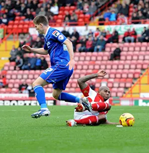 Bristol City V Oldham Athletic Prints: Intense Tackle: Marvin Elliott vs Daniel Philliskirk in Sky Bet League One Clash