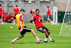 Scotland Tour Prints: Intense Training Showdown: A Battle for the Ball - Bobby Reid vs. Paul Anderson