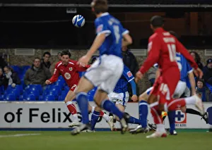 Ivan Sproule crosses for Stern John to score