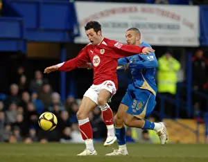 Framed Print : Ivan Sproule escapes the attentions of Nadir Belhadj as he runs through on goal Framed Print : Ivan Sproule escapes the attentions of Nadir Belhadj as he runs through on goal