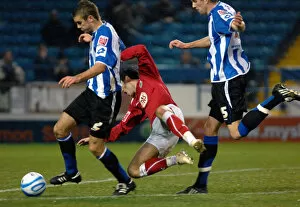 Images Dated 13th December 2008: Ivan Sproule is muscled off the ball