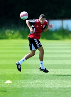 James Wilson: Bristol City's Focused and Ready Footballer in Pre-Season Training