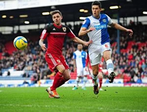 Blackburn Rovers v Bristol City Collection: Jason Lowe Outmuscles Paul Anderson in FA Cup Clash at Ewood Park