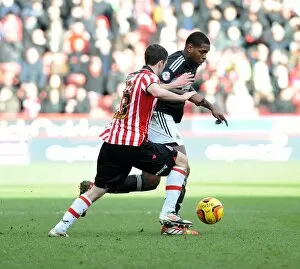 Images Dated 22nd February 2014: Jay Emmanuel-Thomas Chased Down by Jamie Murphy: Sheffield United vs. Bristol City, 2014
