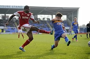 Images Dated 8th March 2014: Jay Emmanuel-Thomas Crosses Ball in Shrewsbury Town vs. Bristol City Football Match