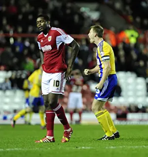 Bristol City V Brentford Prints: Jay Emmanuel-Thomas Disappointment: Brentford's Sam Saunders Scores Against Bristol City
