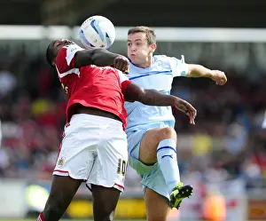 Framed Print : Jay Emmanuel-Thomas Faces Pressure from Blair Adams in Coventry vs. Bristol City Football Match, Sky Bet League One