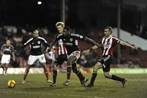 Framed Print : Jay Emmanuel-Thomas Scores Past Brentford Defense in Sky Bet League One Clash