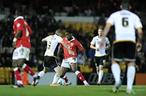 Port Vale V Bristol City Prints: Jay Emmanuel-Thomas vs Carl Dickinson: Intense Moment in Port Vale vs Bristol City Football Match