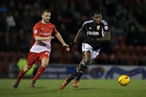 Leyton Prints: Jay Emmanuel-Thomas vs Jamie Ness: Intense Midfield Battle at Leyton Orient vs Bristol City