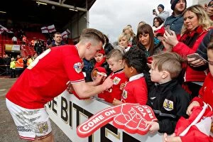 Images Dated 5th March 2016: Joe Bryan of Bristol City Greets Young Fans After Championship Match Against Cardiff City