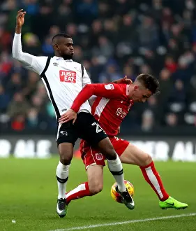 Derby County V Bristol City Prints: Joe Bryan vs Abdoul Camara: Intense Tackle in Derby County vs Bristol City Championship Clash