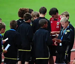 Training Prints: Joe Edwards of Bristol City Signing Autographs During Training