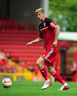 Louis Carey Testimonial Prints: Jon Stead Scores in Louis Carey's Testimonial: A Memorable Moment at Ashton Gate (August 4)