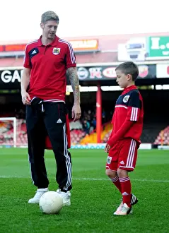 Bristol City V Birmingham City Prints: Jon Stead Training with Mascots: A Playful Moment at Ashton Gate before Bristol City vs Birmingham City