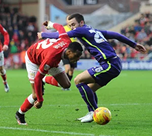 Framed Print : Jonathan Kodjia Slips Past Harry Lennon: A Pivotal Moment in the Bristol City vs Charlton Athletic Championship Clash (December 2015)