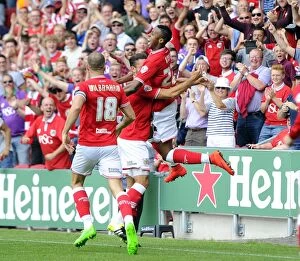 Images Dated 15th August 2015: Jonathan Kodjia's Euphoric Goal Celebration for Bristol City vs. Brentford