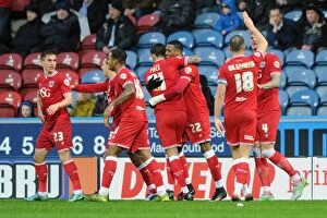 Images Dated 12th December 2015: Jonathan Kodjia's Thrilling Goal Celebration: Huddersfield Town vs. Bristol City