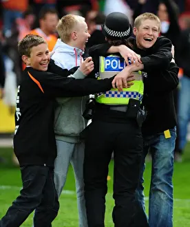 Jubilant Blackpool Fans Celebrate Championship Victory with Police: Blackpool v Bristol City (02/05/2010)