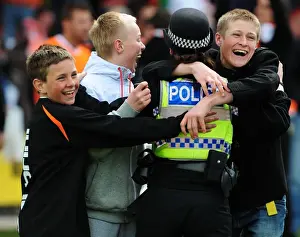 Jubilant Blackpool Fans Celebrate with Police after Championship Victory over Bristol City (02/05/2010)