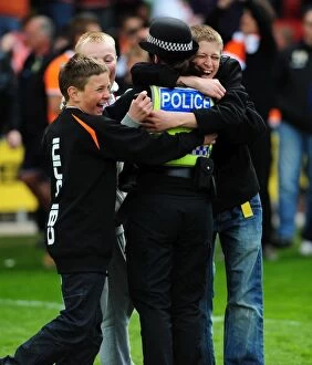 Images Dated 2nd May 2010: Jubilant Blackpool Fans and Police Celebrate Championship Victory over Bristol City (02.05.2010)