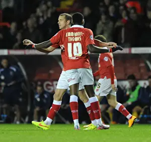 Jubilant Reunion: Jay Emmanuel-Thomas and Aaron Wilbraham Celebrate Bristol City's Win Against AFC Wimbledon